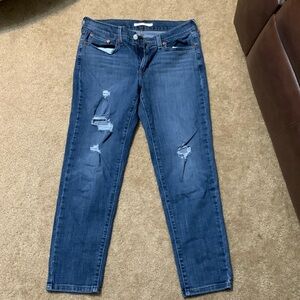 Levi’s boyfriend jeans.  27x27